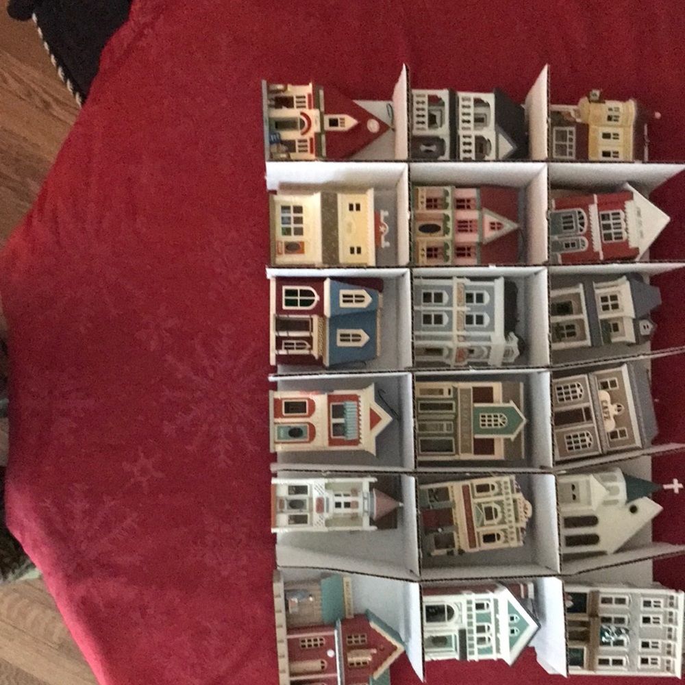 Assortment of Hallmark Christmas House Ornaments